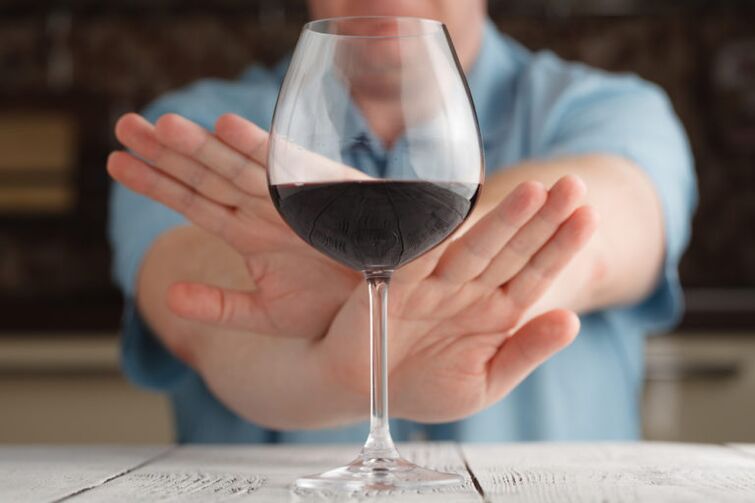 Oflehnung vun engem Glas Wäin
